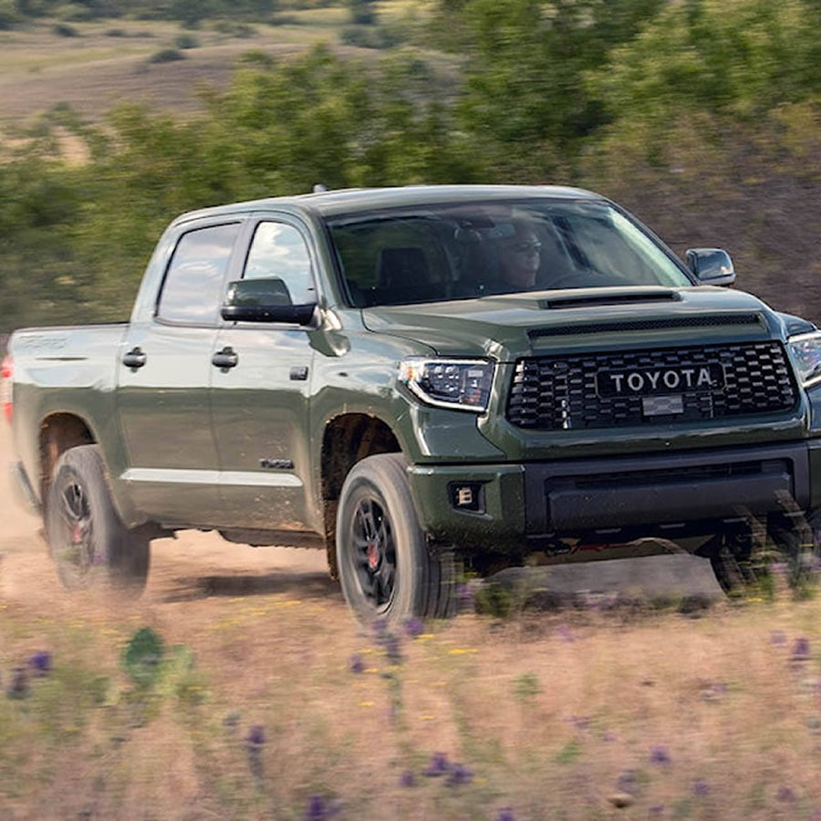 Front view of a dark green Toyota Tundra
